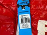 red puffer jacket with a tag attached to the back of it