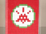 a picture of a red and green tile with white squares