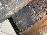a close up of a piece of wood on a table