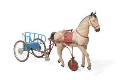 a small toy horse pulling a cart with a horse