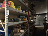 a room with a lot of boxes and boxes on the shelves