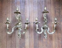 PAIRE D'APPLIQUES à trois bras de lumière en bronze ciselé e…