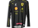 a black long - sleeved shirt with yellow and red logos on it