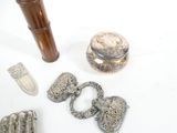 a lot of silver items that are on the table