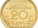 an old french 20 franc coin on a white background