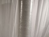 a picture of a plastic wrapped vase on a table