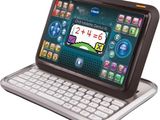 a tablet computer with a keyboard on top of it