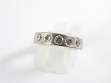 an image of a three stone ring on a white background