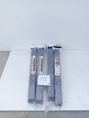 two pieces of luggage sitting on top of a white table