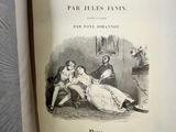 a book with a picture of a man and a woman sitting on a couch