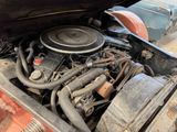 an old car engine with a lot of rust on it