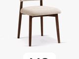 the two chairs are next to each other on a white background