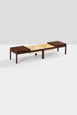 an image of a wooden bench sitting on top of a white floor