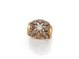 an 18k gold and diamond ring