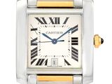 une montre en argent et en or dont le cadran est orné de chiffres romains