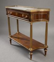 CONSOLE-DESSERTE en placage d'acajou orné d'encadrements de …