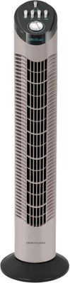 a silver and black tower fan sitting on top of a table