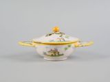 underside view of a soup bowl and cover showing the yellow rim