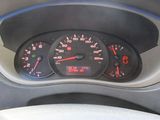 a close up of a car dashboard with a speedometer