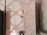 une boîte sur laquelle figure l'image d'un distributeur d'eau