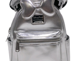 a small silver backpack with a bow on the front