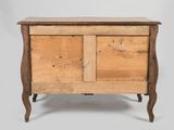 an old wooden chest sitting on top of a wooden table