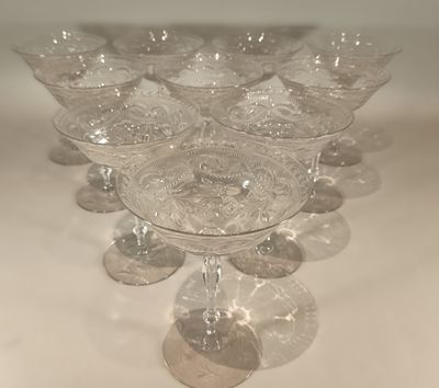 a lot of empty wine glasses sitting on a table