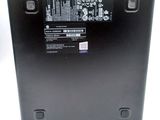 the back of a laptop with a black back panel and a white back panel