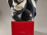 a mannequin with a scarf on it and a red box