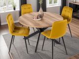 une table à manger avec quatre chaises jaunes et un vase posé dessus