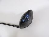 a close up of a golf driver ' s head on a white surface