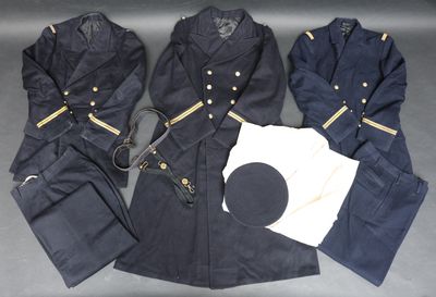 several pieces of military clothing are laid out on a table