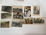 a lot of old photos on the wall of this room
