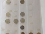 a lot of coins in a plastic bag on the table