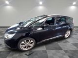 a picture of a black car in a showroom