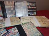 many different types of stamps on the pages of a book