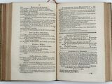 an open book with a black and white title on it