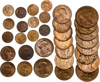 a bunch of coins sitting next to each other on top of a white surface