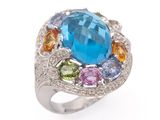 an image of a blue topaz ring with multi colored stones