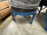 an image of a large metal drum in a warehouse