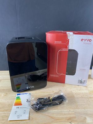 an image of a box with a remote control and a box with a charger