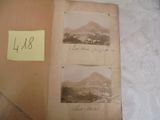 une vieille photo d'un livre sur lequel figurent deux images de montagnes