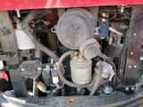 a close up view of the engine of a tractor