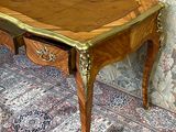 a small table with a drawer on top of it