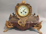 a clock that is sitting on top of a table
