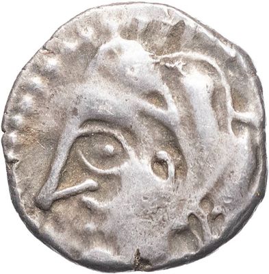 une pièce d'argent sur laquelle figure un visage