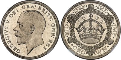 a close up of a coin with a crown on it