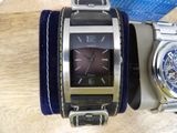 two watches that are sitting on top of each other