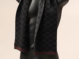 black and red scarf on a mannequin head