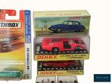 three different models of cars in the box